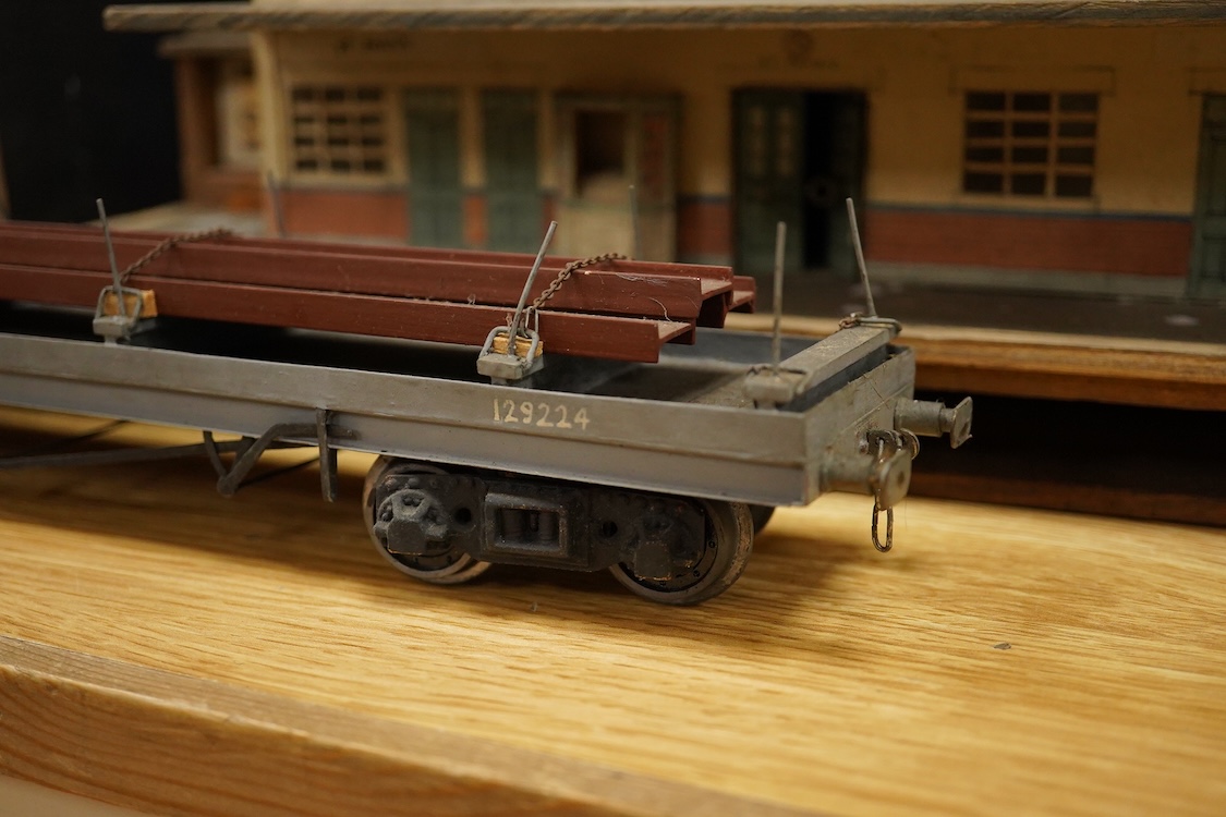 Eleven 0 gauge railway wooden freight wagons, wooden bodies and most possibly kit built using Bonds etc. parts, including a Leeds bogie mineral wagon, together with two kit or scratchbuilt wooden London Underground stati